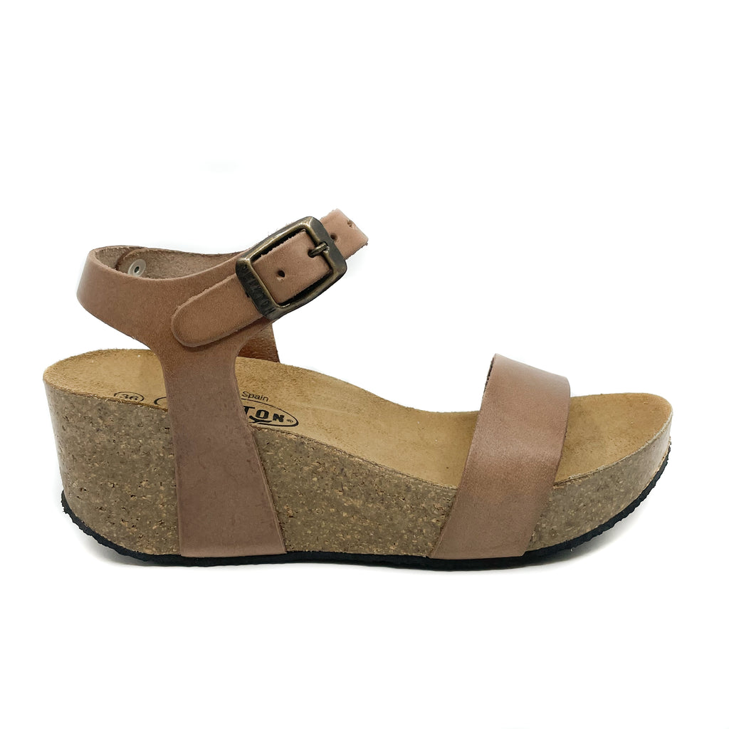 Behold the timeless elegance of Plakton's 273023 Tan Wedge Sandals, radiating style and eco-conscious sophistication from every angle. Step out in sustainable chic.