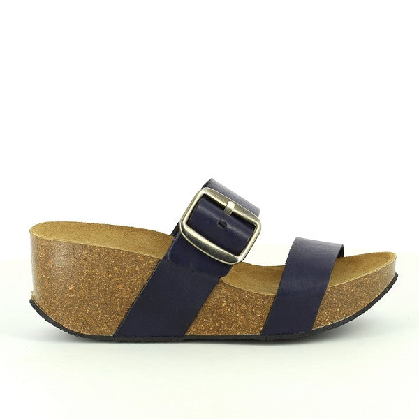 Behold the sleek side profile of Plakton's 273004 Navy Wedge Sandals. Crafted with premium natural leather and featuring a contoured cork footbed, these sandals epitomize comfort and style. Elevate your ensemble with sustainable sophistication. 